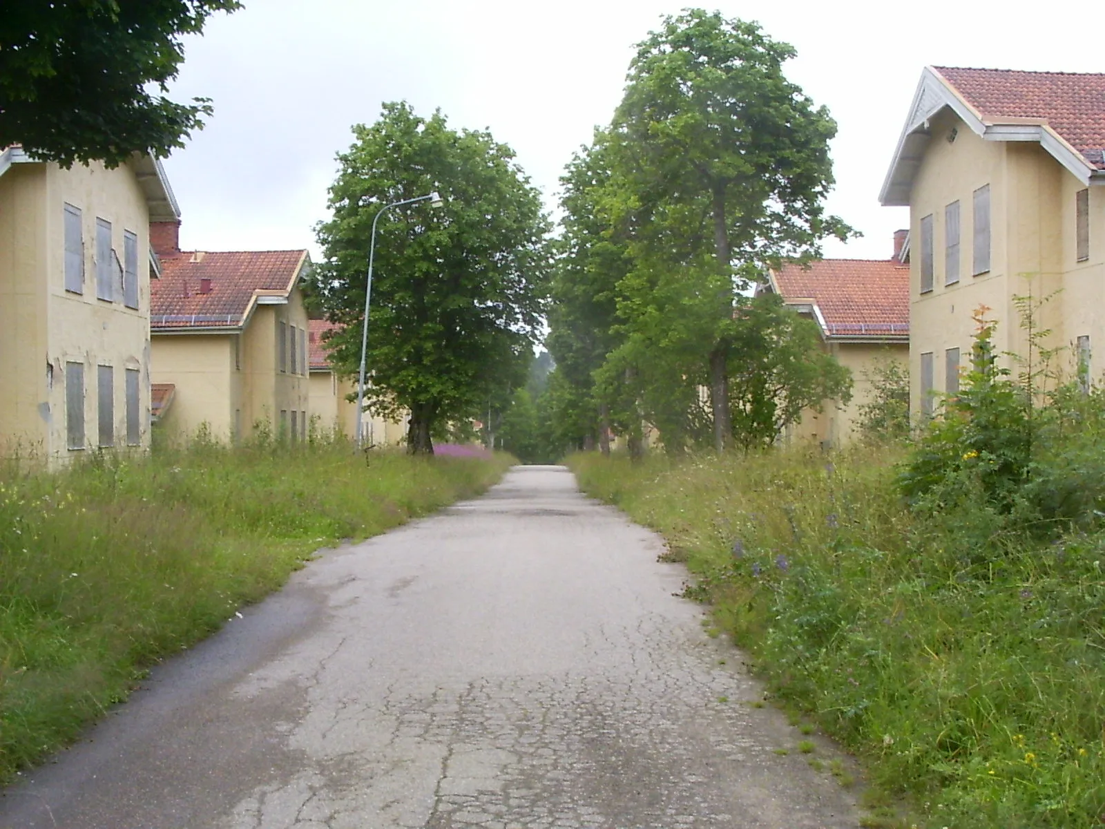 Abandoned red wooden miners' cottages at Källfallet in Grängesberg, Dalarna
